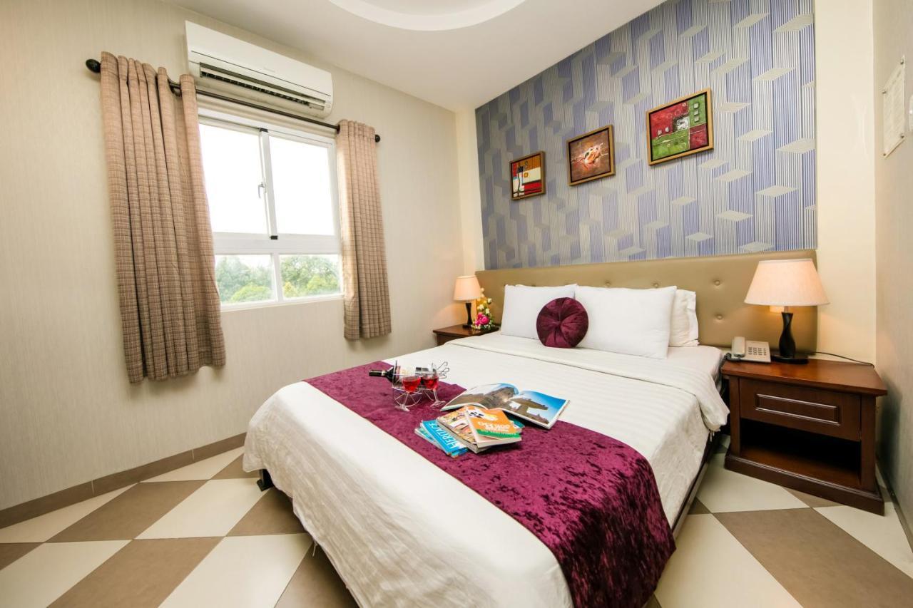 Quy Hung Hotel Central Хошимин Екстериор снимка