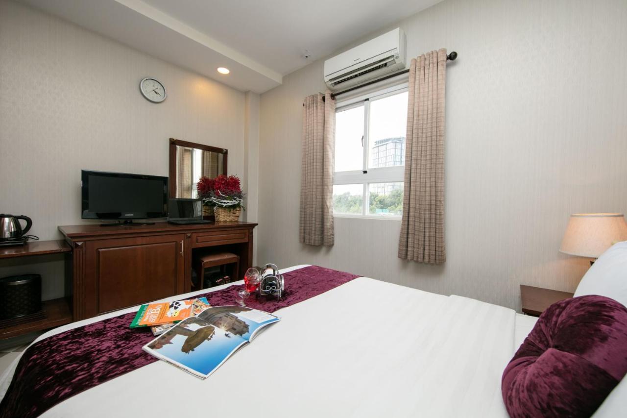 Quy Hung Hotel Central Хошимин Екстериор снимка
