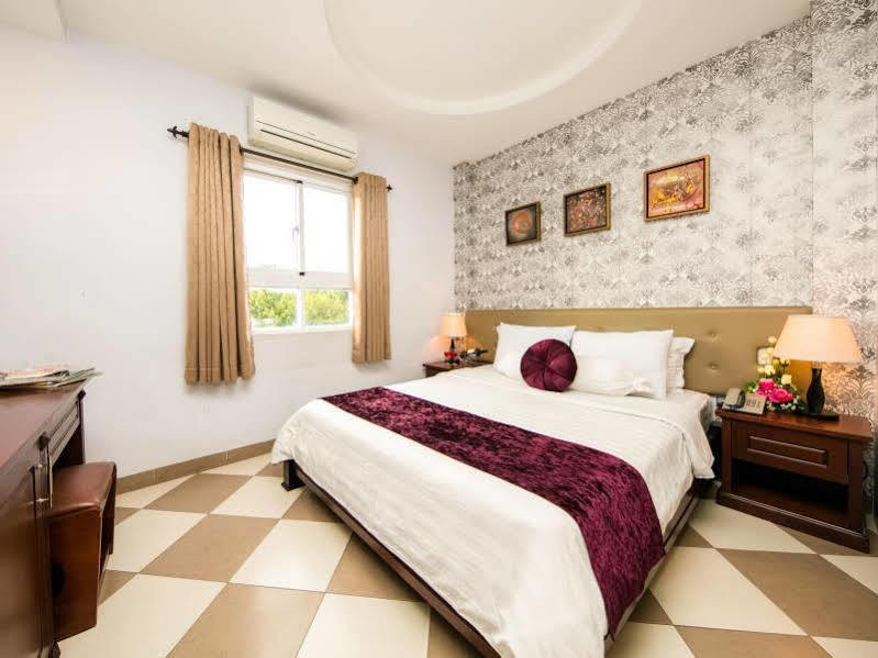 Quy Hung Hotel Central Хошимин Екстериор снимка